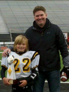 Corey (8yrs old) & dad after winning the 2008 Pittsburgh Youth Football Championships - Bethel Park Stadium - Nov. 2008